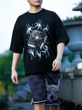 Horroric Hands to a Book for Spooky Night Graphic Tee - DIAI